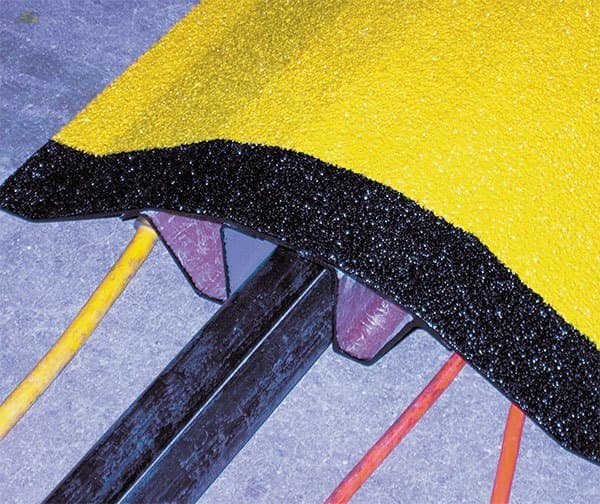 pipe-cable-cover-hero Yellow and black Anti slip pipe and cable covers