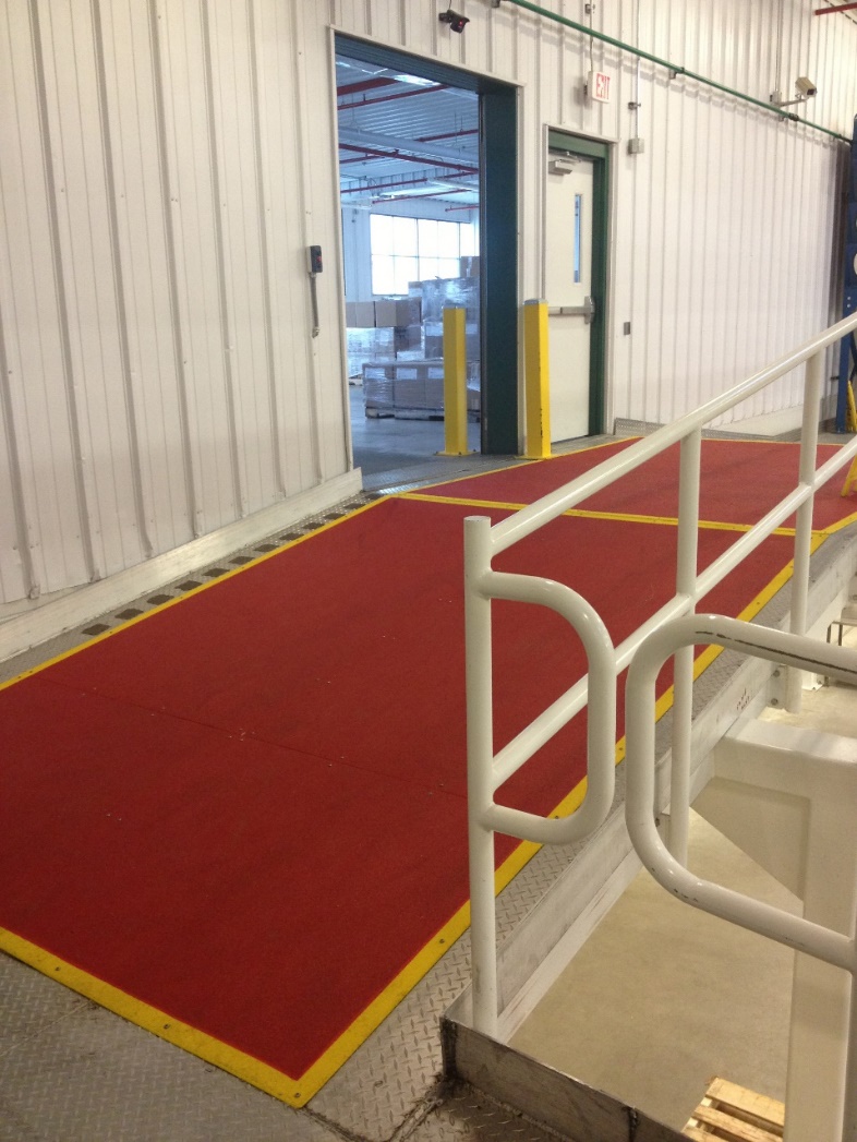 Safeguard Hi-Traction® anti-slip walkway covers an entire aluminum ADA-accessible ramp