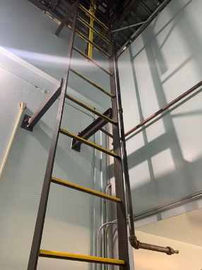 Yellow Anti-Slip Ladder rungs on metal ladder