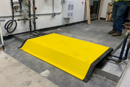 Large Yellow Pipe Cover over pipes